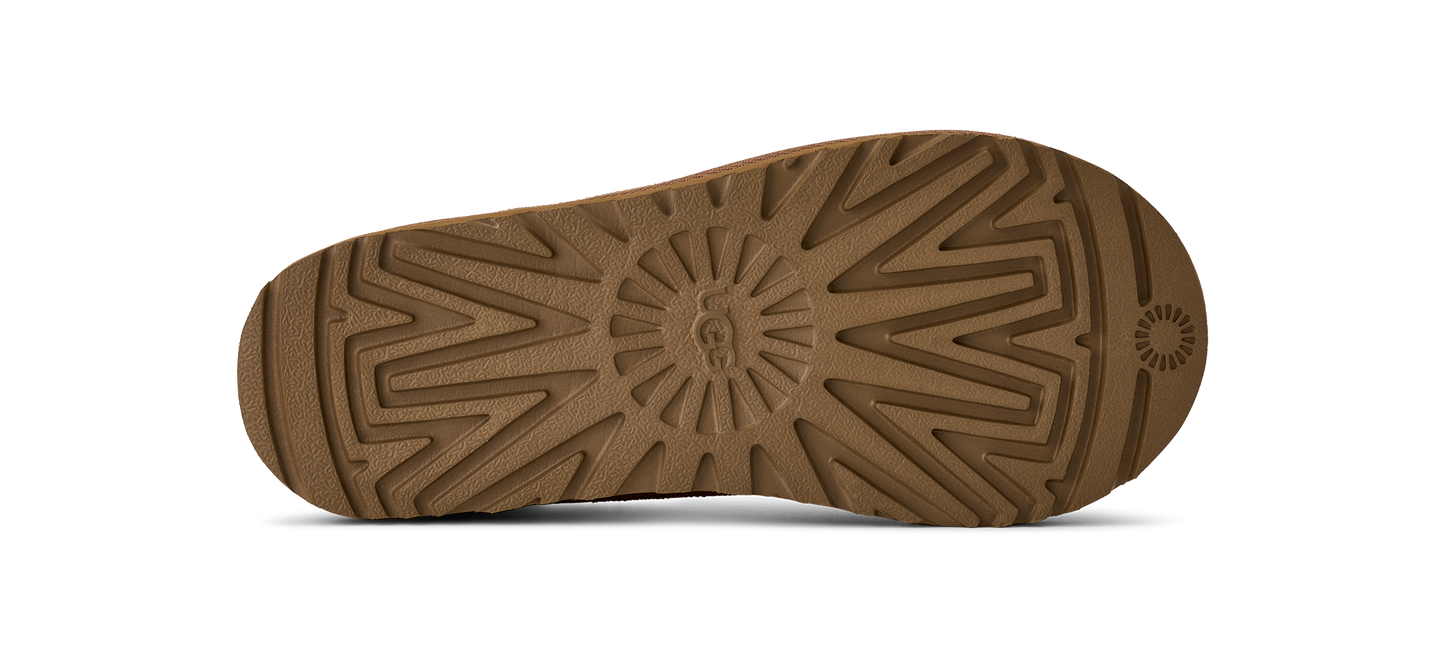 The patterned sole of a boot.