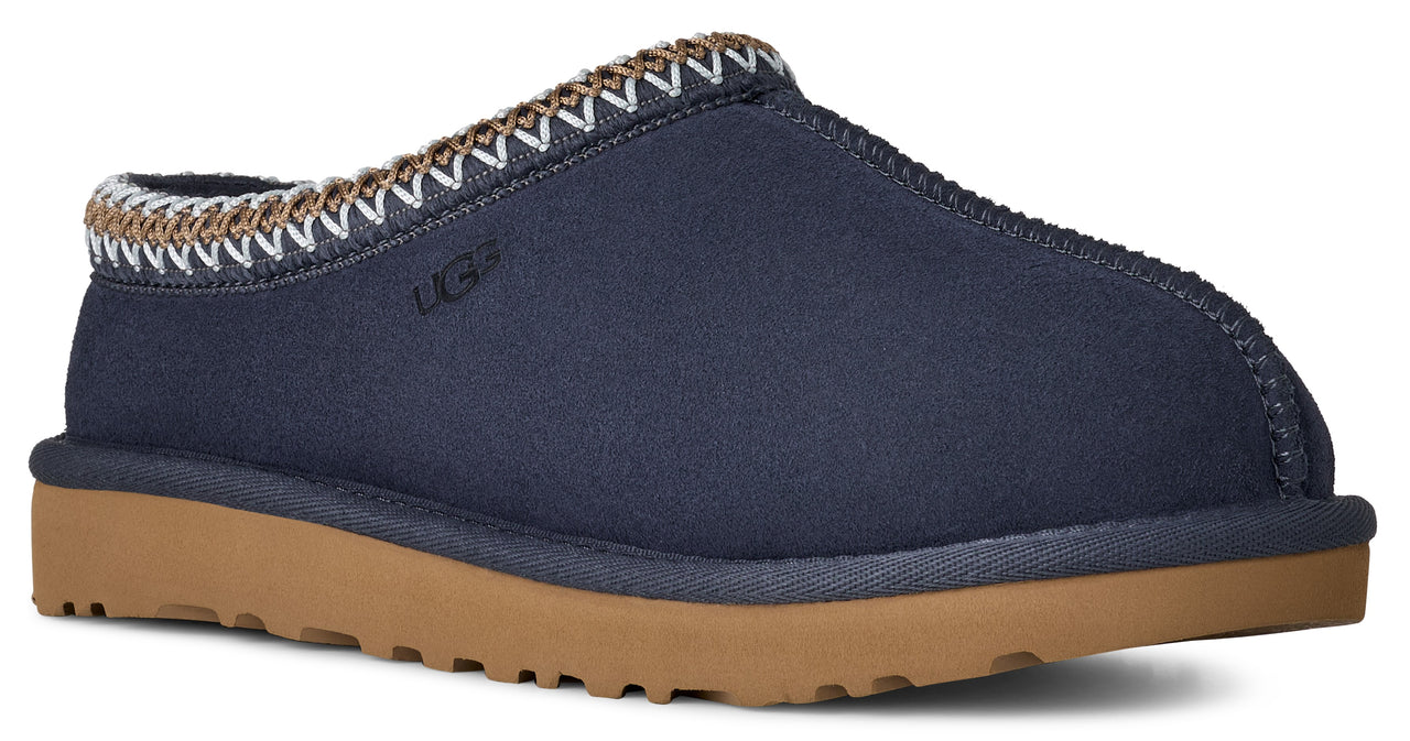 Navy blue slipper with brown sole and decorative stitching.