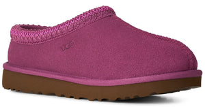 A fuchsia suede slipper with a braided trim around the opening and a brown textured rubber sole.