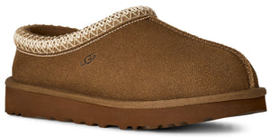 A brown suede slipper featuring a distinctive woven trim along the collar and a thick, matching brown rubber platform sole, with the UGG logo embossed on the side.