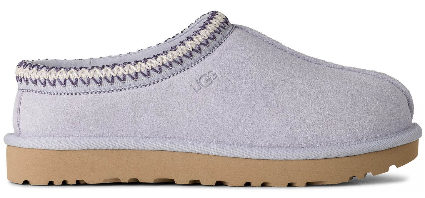 Slip-on style shoe in lavender with a tan sole and a lavender and white knit cuff.