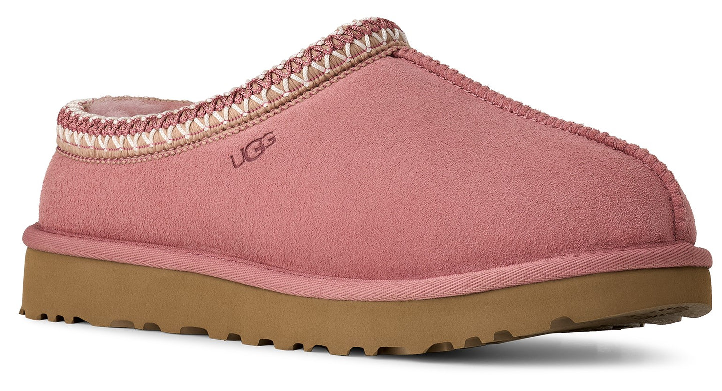 Pink suede slipper with patterned trim and tan sole.