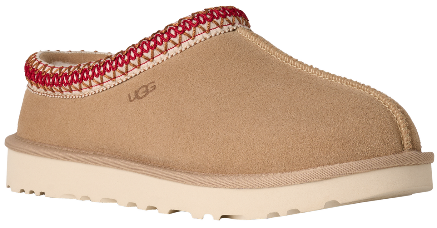 Tan slipper with red and white trim and a white sole, featuring the logo "UGG".