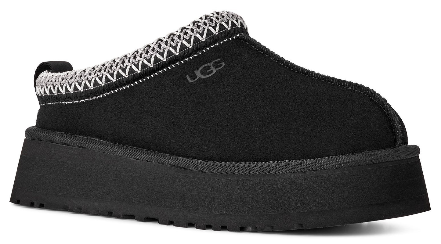 Black clog with platform sole and UGG logo.