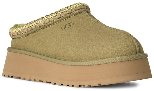 Slip-on platform shoe in light brown suede with decorative woven trim and logo.