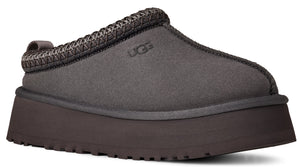 Dark grey mule slipper with platform sole and "UGG" logo.