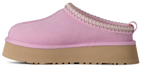 A light pink UGG Tasman slipper with a tan platform sole and tan and white knit trim.