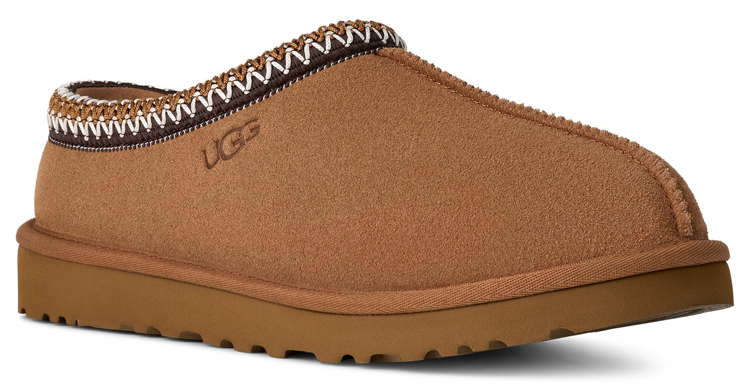 Tan-colored slipper with a decorated trim.