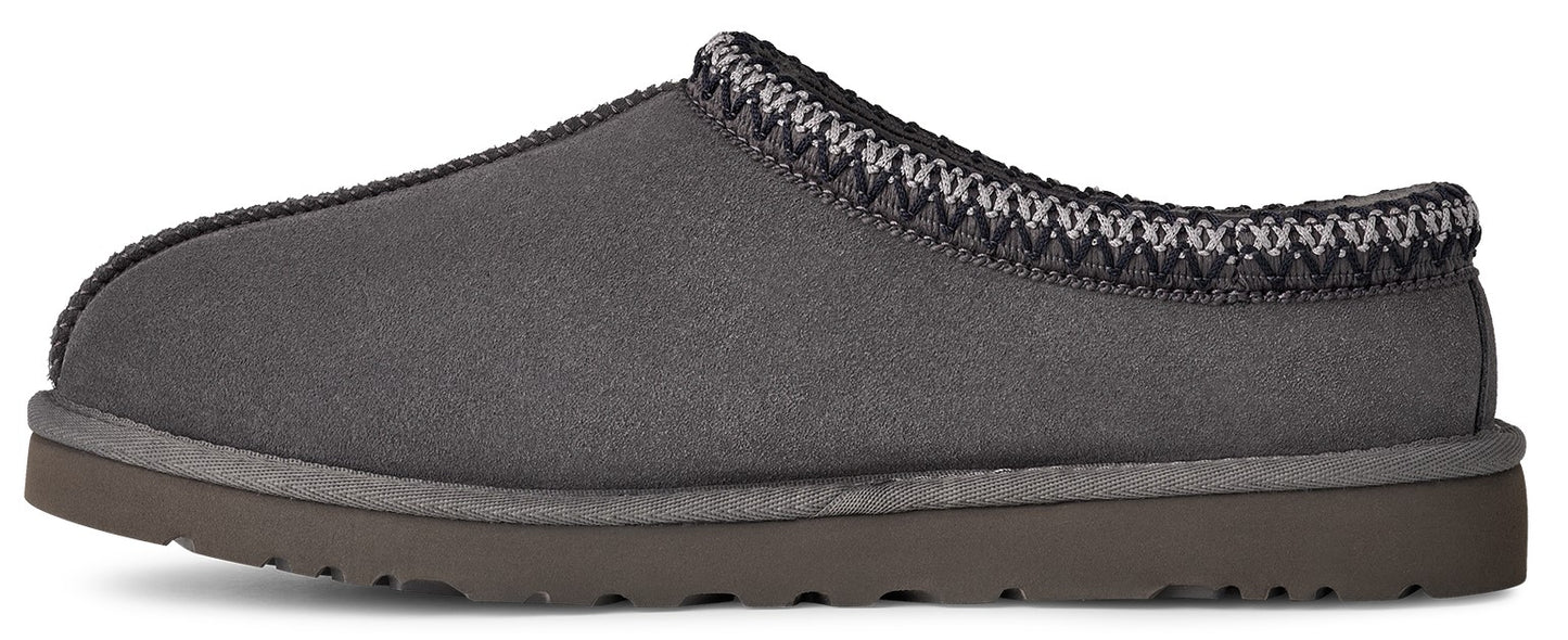 A dark grey slipper with a woven trim.