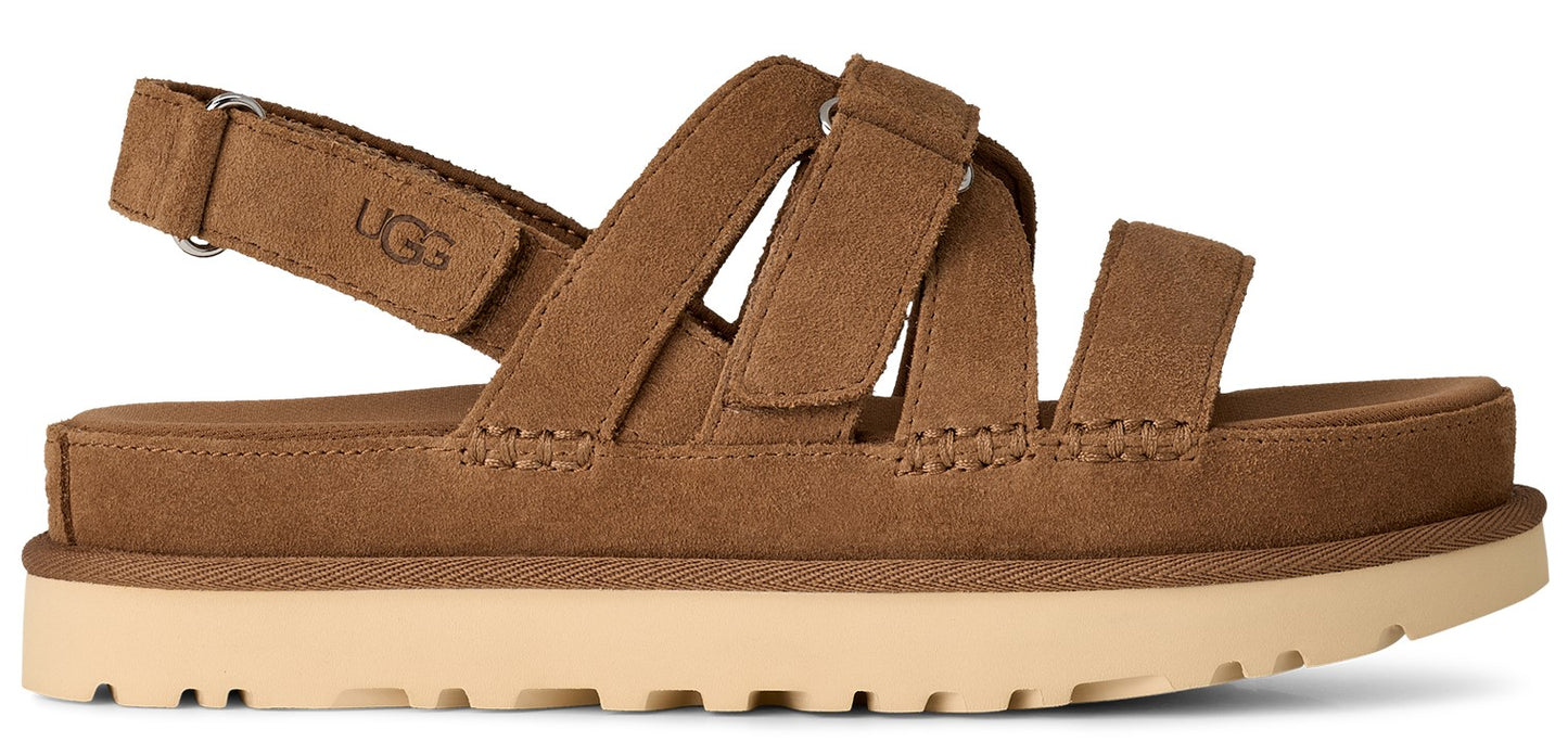 A brown UGG sandal with adjustable straps.