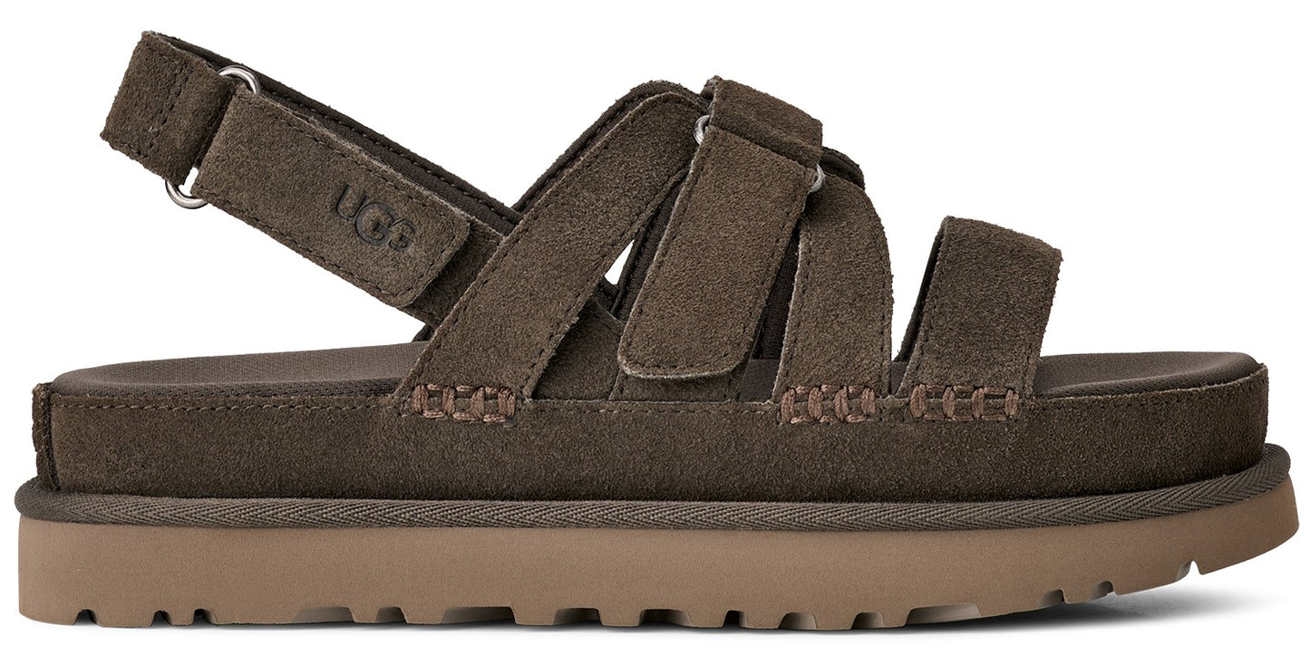 A dark brown sandal with multiple suede straps.