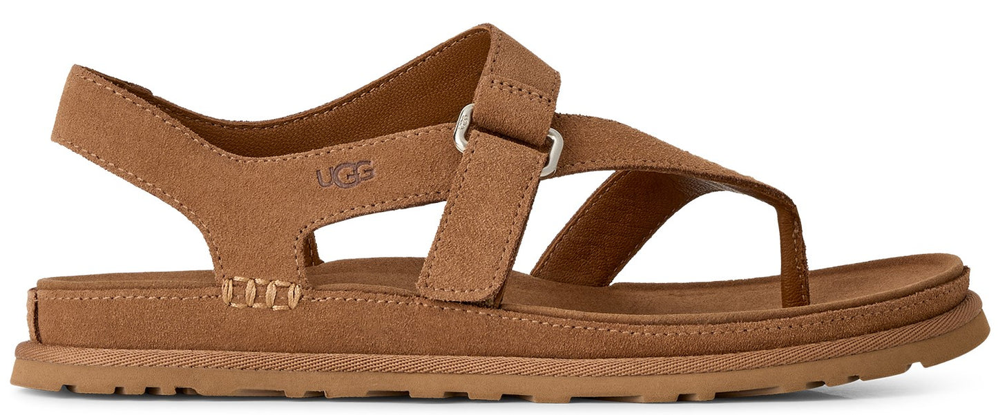A brown sandal with a toe post and ankle strap.