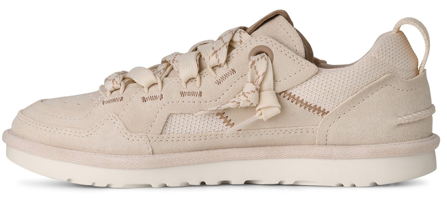 Beige sneaker with textured laces and a low profile.