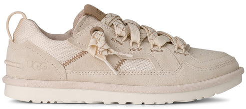 A beige sneaker with thick laces.