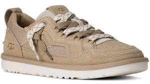 Tan suede sneaker with white laces and a white rubber sole.