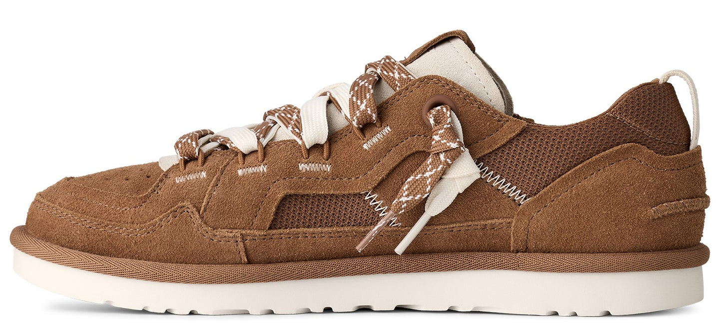 A low-profile, brown suede shoe with decorative white and brown laces and a chunky white sole.