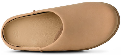A top-down view of a tan suede leather mule slipper with a smooth, minimalist design and an open-back construction.