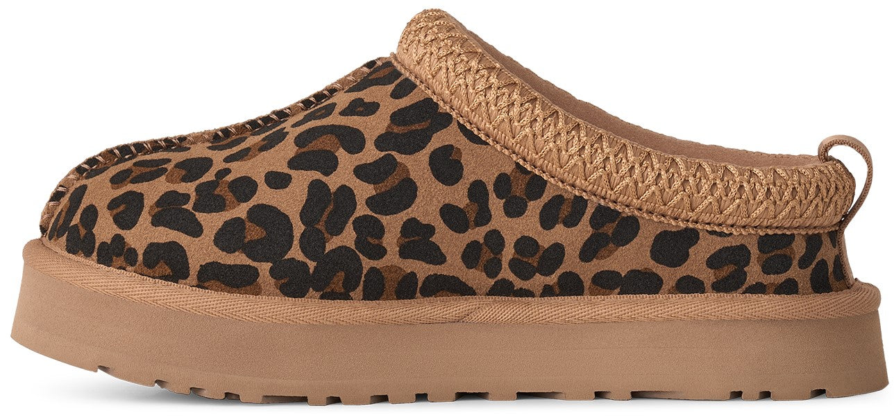 A slip-on slipper with a leopard-print upper, a thick tan platform sole, and a woven braided trim along the collar.