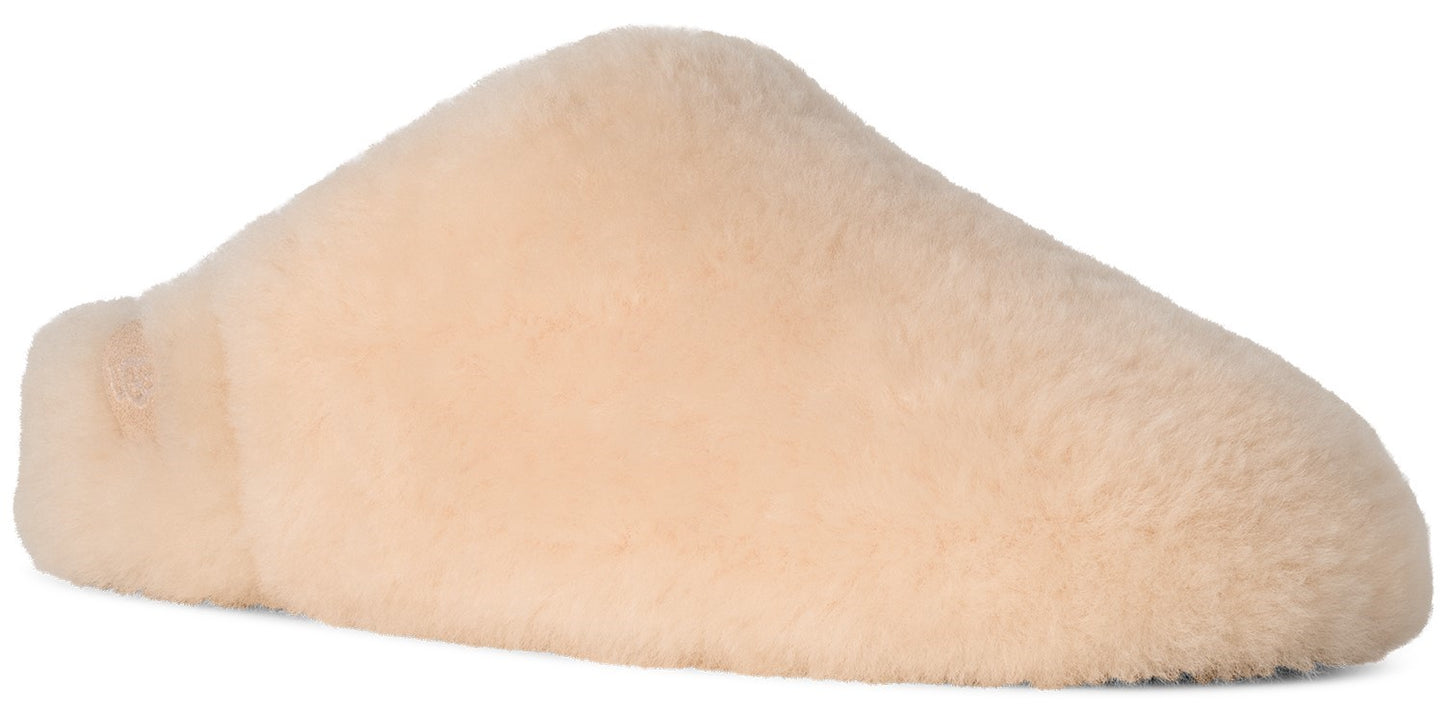 A beige, fluffy, slip-on slipper viewed from the side, with a thick, textured, fleece-like material covering the entire exterior.