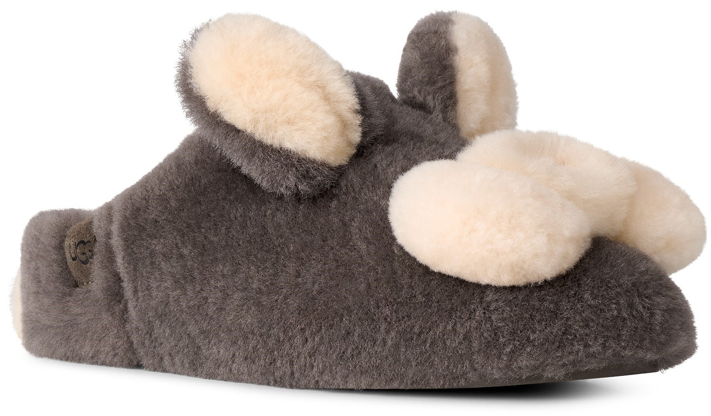 A gray, fuzzy, plush slipper designed to look like a mouse, with two cream-colored circular ears standing upright and a cream-colored pom-pom on the toe area, featuring a small UGG logo embossed on the side.