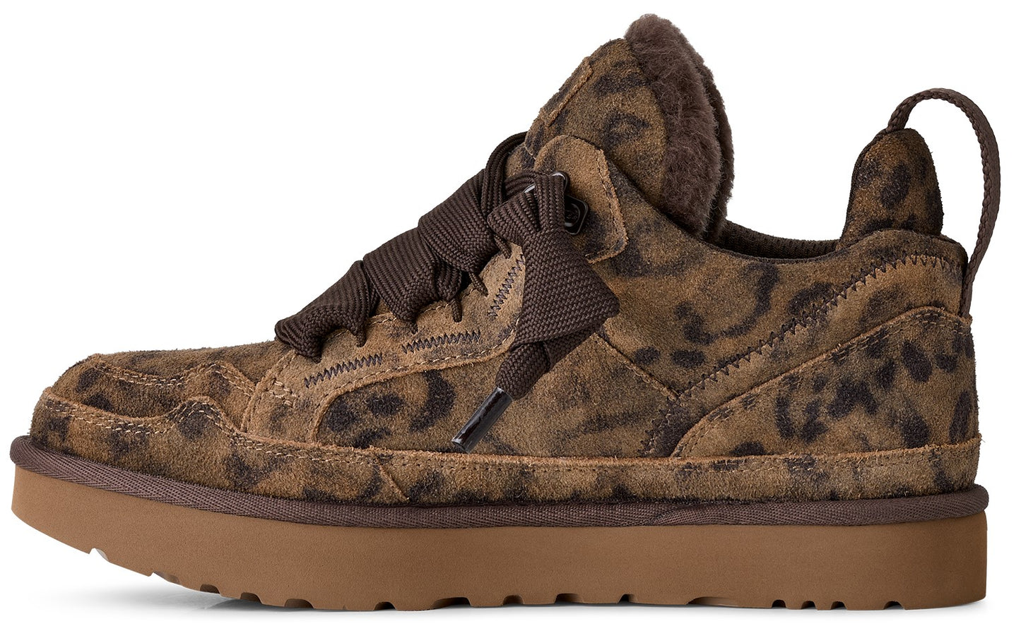 A brown and tan leopard-print suede sneaker with wide, dark brown laces, a thick tan rubber platform sole, and a dark brown faux-fur lining visible at the collar.