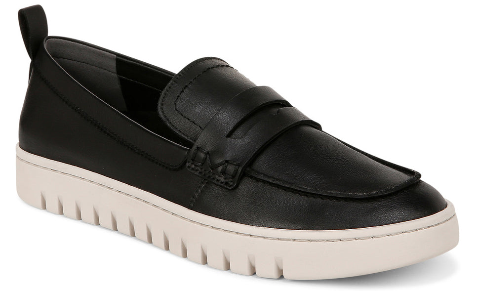 Black loafer with a white platform sole and a heel pull tab.