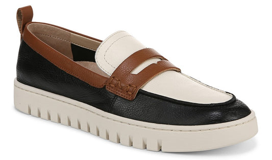 Penny loafer with a white vamp, black quarter, brown accents, and a chunky white sole.