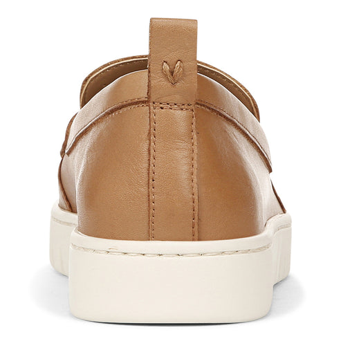 Tan loafer style shoe with white platform sole; rear view.