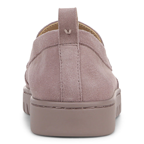 Low, mauve suede shoe with thick sole and pull tab, rear view.
