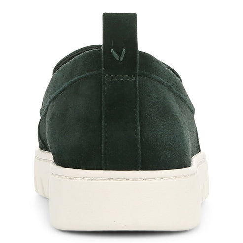 Dark green suede slip-on shoe with a thick white sole and a small green fabric heel pull.