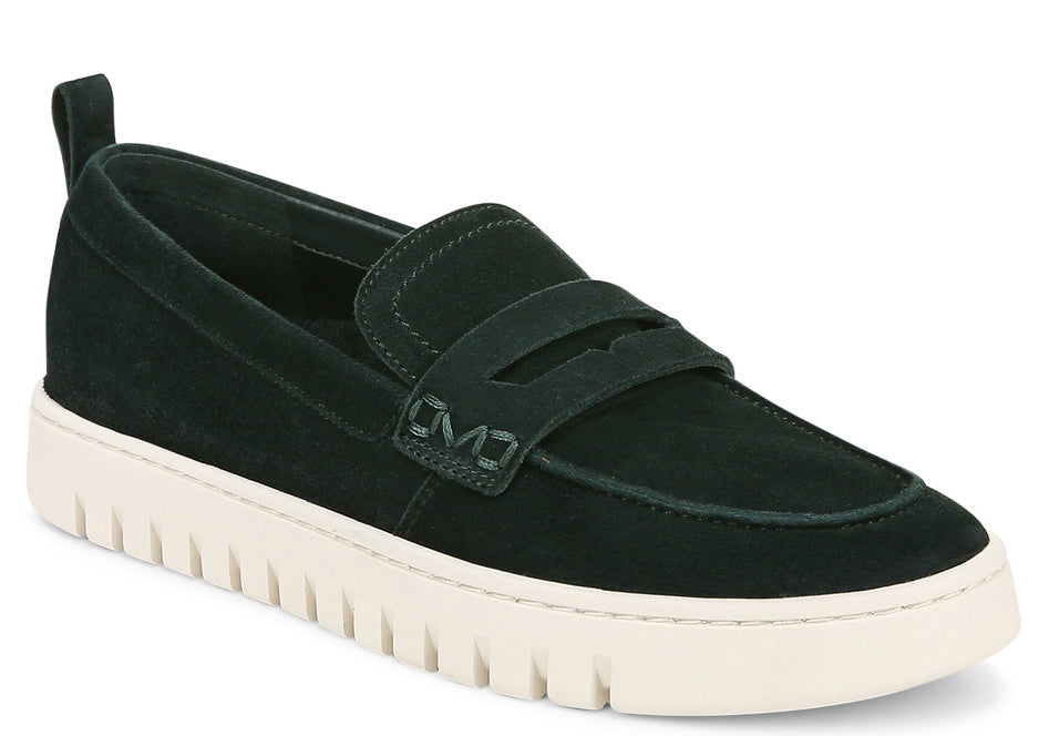 A dark green suede loafer with a thick, white sole.