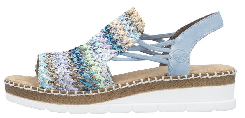 A women's blue multi-colored sandal with a textured open toe and white sole.