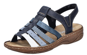 A sandal with multiple blue, light blue and white straps arranged horizontally across the foot and around the ankle