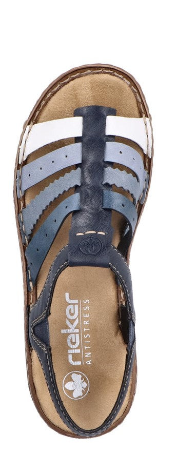 A sandal with white, light blue, and blue straps.