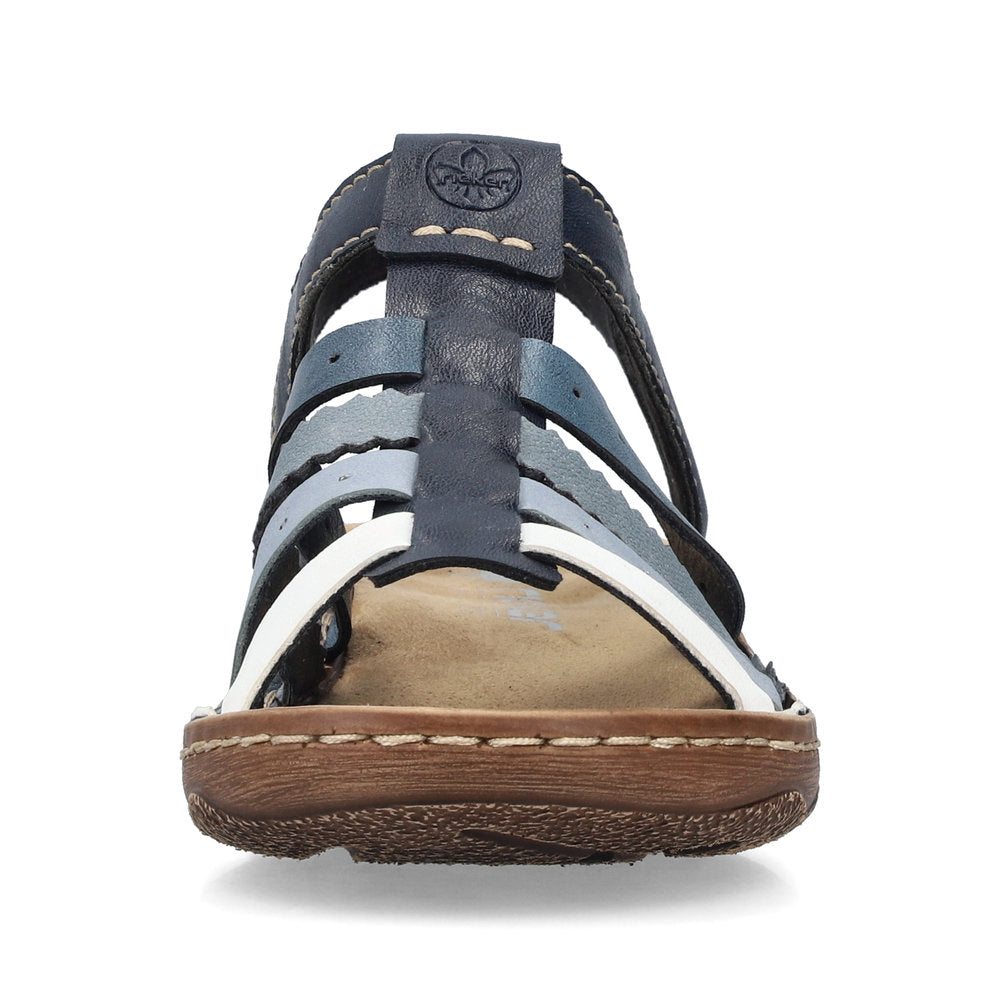 Front view of navy, blue, and white strappy sandal with brown sole.