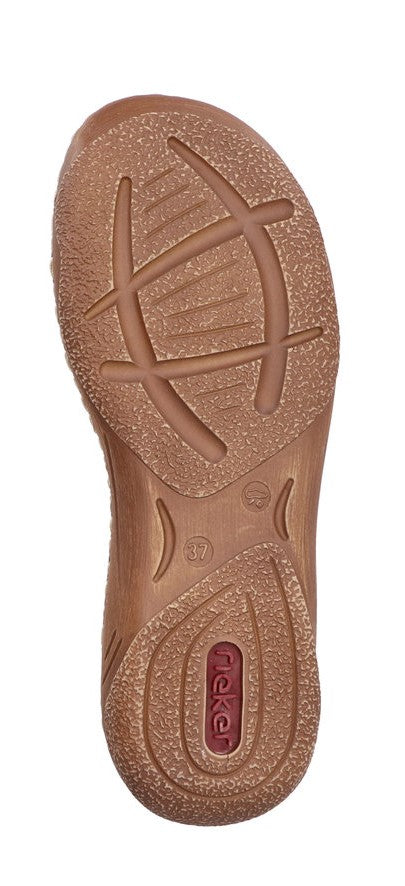 sole of a shoe with a circular tread pattern and the word 'Rieker' visible