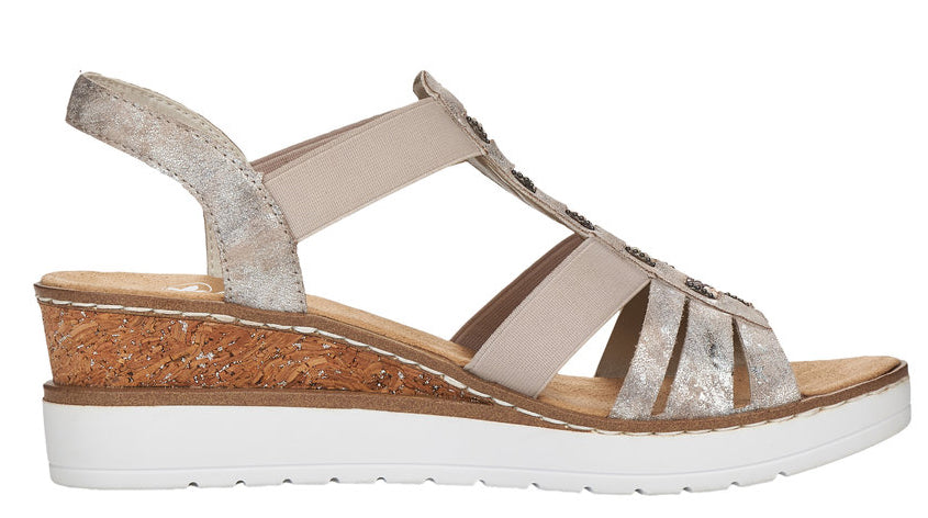 Womens wedge sandal with elastic straps, a cork sole, and a white platform.