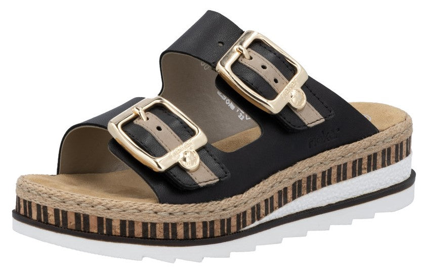 Black sandal with two straps, gold buckles, platform sole with decorative stripes.