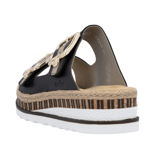 Espadrille sandal with a black upper, a large gold buckle, and a striped platform sole.