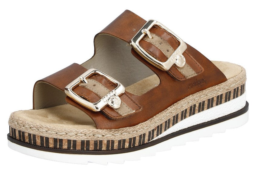 Brown sandal with two straps and metal buckles, on a jute and platform sole.