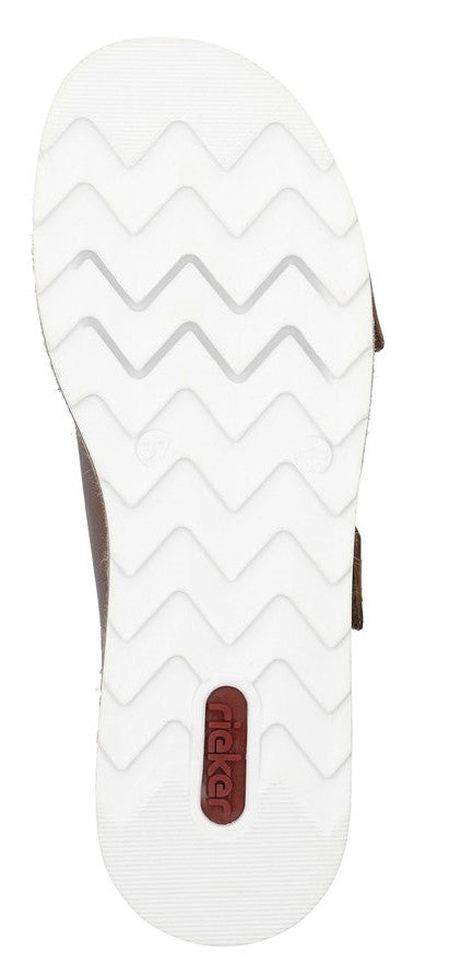 Bottom view of a sandal with a white sole and a brown logo.
