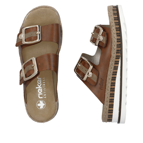 Two-strap brown sandal with silver-tone buckles and a beige and white sole. The insole reads rieker ANTISTRESS