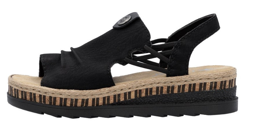 Black sandal with toe loop, crisscross straps, and platform sole.