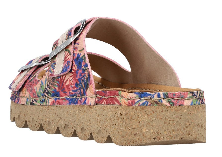 Side view of a pink floral sandal with two buckle straps and a thick cork sole.