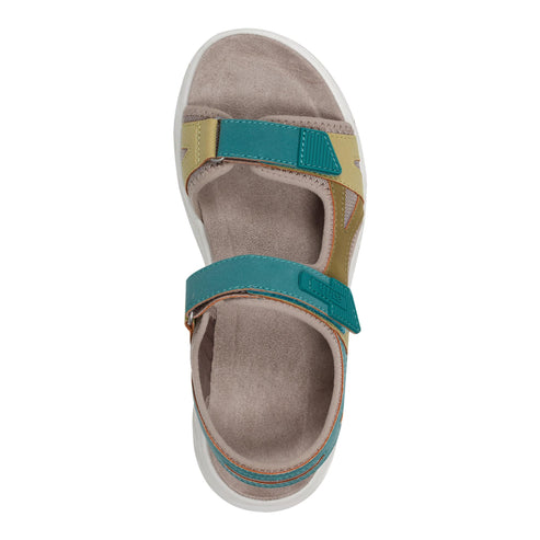 Flat sandal with taupe footbed and teal and tan velcro straps.