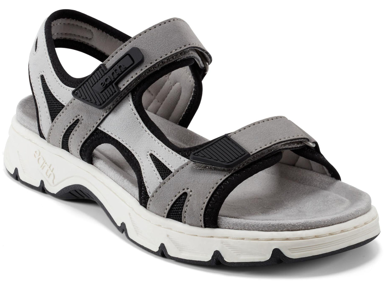 A gray adjustable sandal with a white sole.
