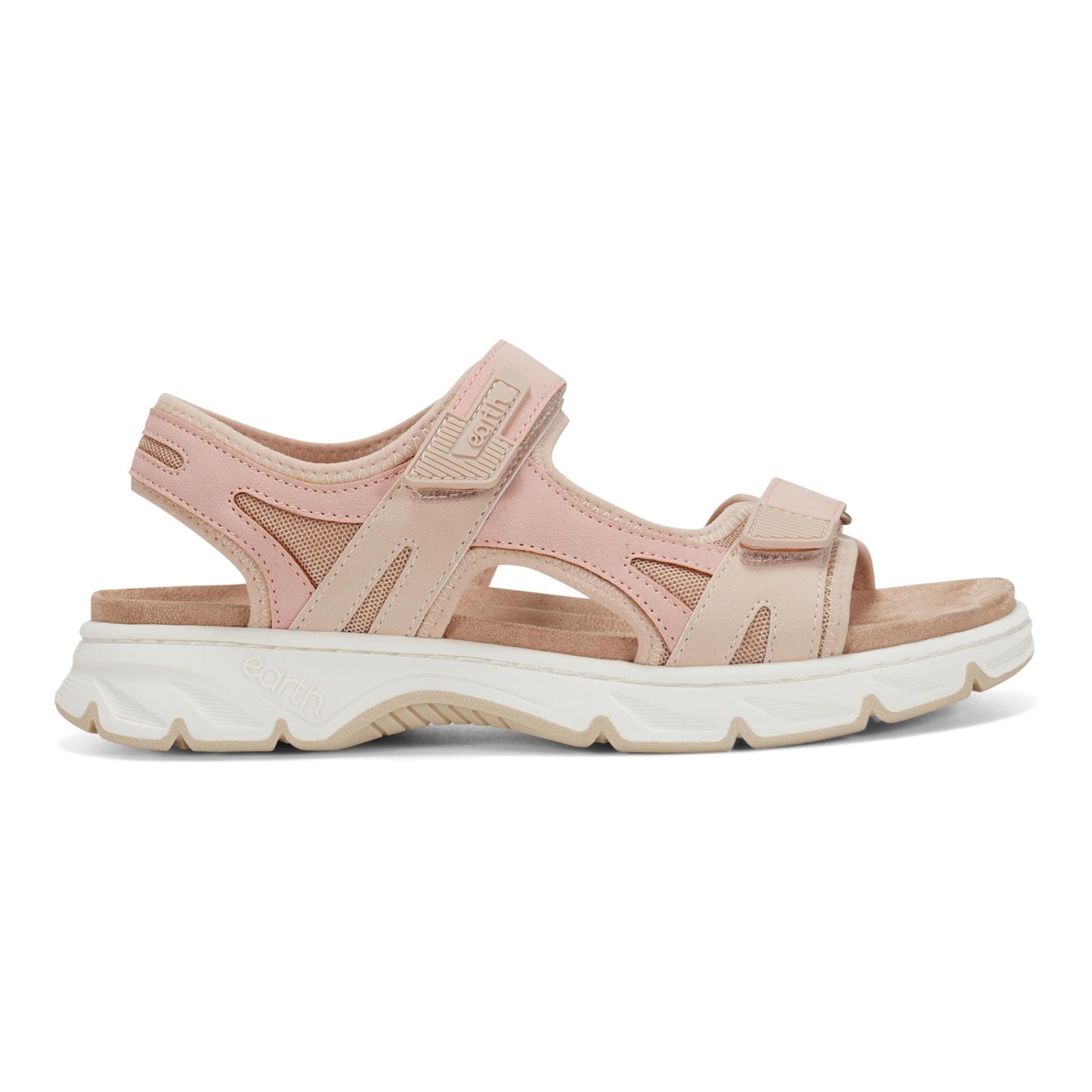 A pink sandal with velcro straps and a white sole.