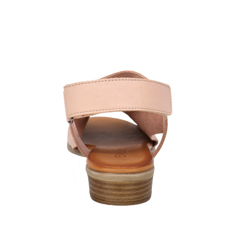 Pink sandal with thick heel, visible straps and sole