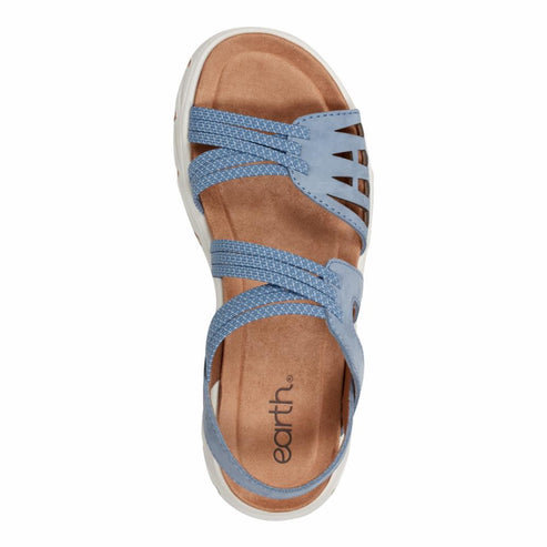 Blue sandal with multiple straps and a flat, white sole.