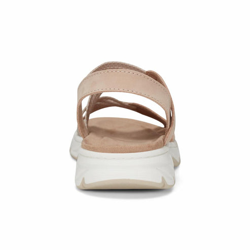 Open-toed light pink sandal with white sole and adjustable straps.